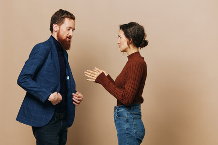 Man and woman couple in a relationship quarrel, yelling, psychological violence in the family, problems in a real relationship between peopleの写真素材