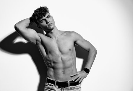 man fit trendy muscle strength muscular bicep trend bodybuilder athletic healthy stylishの写真素材