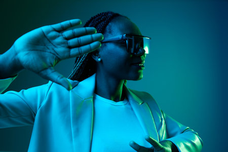 African american woman portrait business smile and fashion wearing glasses on blue background in...