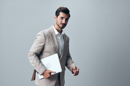 freelancer man business internet smiling copyspace job model computer laptop suitの写真素材