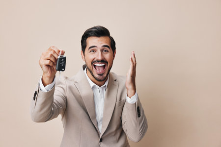 service man business smile holding giving hand key buy car autoの写真素材