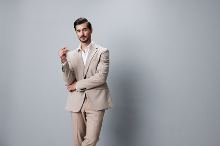 beige man happy business suit copyspace smiling portrait businessman tie handsomeの写真素材