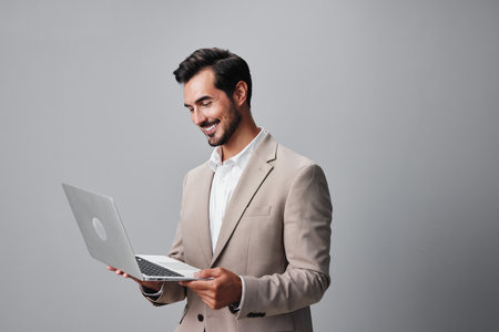 man business handsome freelancer smiling suit job computer copyspace laptop internetの写真素材