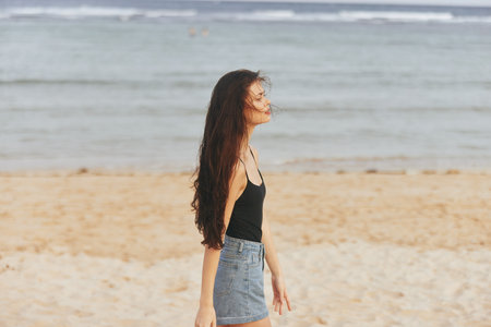 ocean woman sand vacation beach relax smile lifestyle sunset sea summer