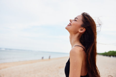 smile woman ocean nature beach summer vacation sea sun sand youngの写真素材