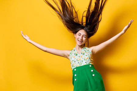 woman trendy emotion fashionable yellow stylish fashion young happy style beautifulの写真素材