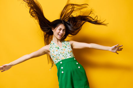 style woman beautiful stylish happy emotion trendy yellow young portrait fashionの写真素材