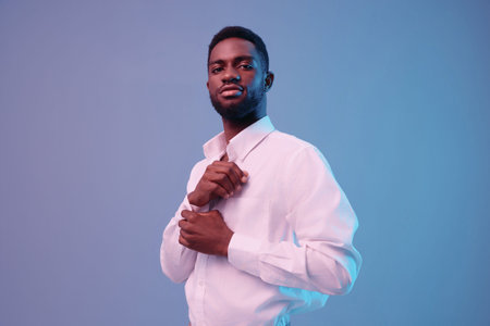 neon man businessman color technology studio model expression portrait light artの写真素材