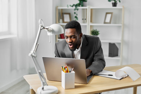 office man laptop american job freelancer computer indoor african student education onlineの写真素材