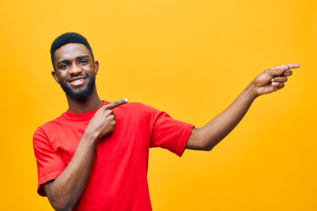 red man black guy fashion expression orange background african american attractive portrait americanの写真素材