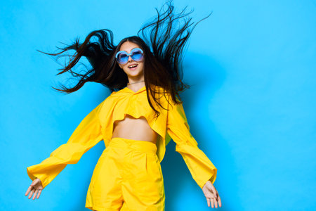 woman lifestyle girl model young trendy fashion sunglasses beautiful attractive yellow