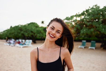 woman sand smile beach nature holiday sea vacation summer ocean youngの写真素材