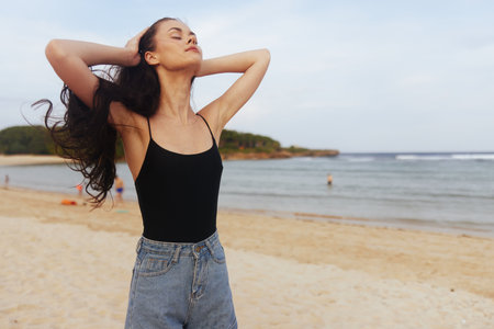 woman vacation summer sea ocean nature sunset sand smile beach lifestyleの写真素材