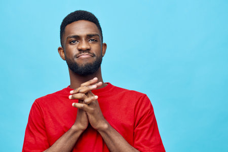 guy man black portrait american american blue red trendy handsome african fashion backgroundの写真素材