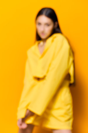 model woman attractive yellow beautiful girl fashion expression lifestyle trendy youngの写真素材