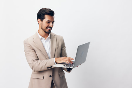 man work computer freelancer laptop smiling copyspace internet business suit jobの写真素材