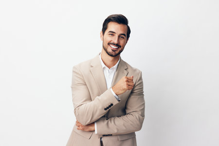 beige man copyspace suit smiling businessman happy smile handsome portrait businessの写真素材