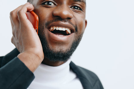 man message phone smile black technology mobile young businessman happy africanの写真素材