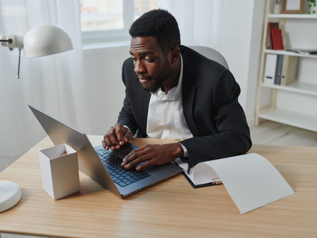 online man education laptop office freelancer american student job computer career africanの写真素材