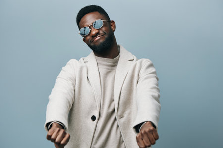 man jacket american style black stylish earring fashion model portrait african americanの写真素材