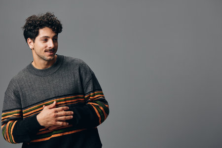 Happiness man fashion hipster copyspace modern sweater handsome smile face beautiful person trendy portraitの写真素材