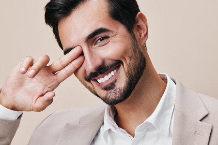 man handsome business beard beige businessman smiling happy portrait suit copyspaceの写真素材