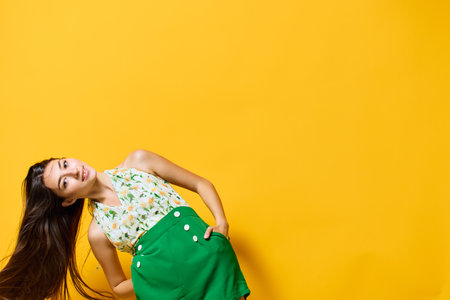 person woman style beautiful stylish trendy fashion young happy emotion yellowの写真素材