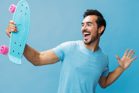 Studio man skate active skateboard summer lifestyle guy copy space portrait sport skater hipsterの写真素材