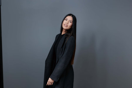 Woman smile lifestyle coat fashion trendy beauty asian gray beautiful fall brunetteの写真素材