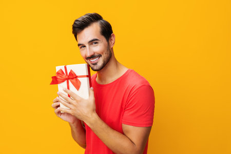 Man christmas birthday surprise guy gift box present celebrate male valentineの写真素材
