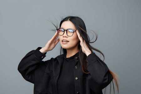 Beautiful woman studio background portrait asian glasses fashion smile
