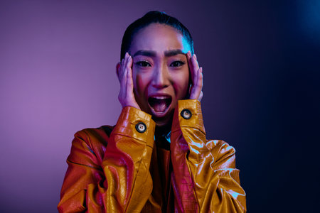 Woman fashion disco beauty light colorful purpleの写真素材