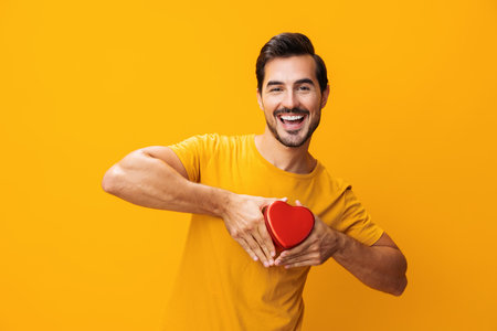 Romantic man shape heart studio romance valentine gift love happy portraitの写真素材