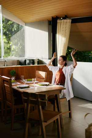 Young women female lifestyle home girl person restaurant healthy food beautiful tableの写真素材