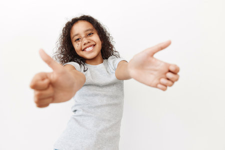 Woman young little girl person girl cute cheerful portrait happy background childhood smile beauty femaleの写真素材