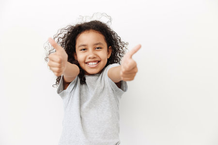 Beauty childhood person female young happy cute girl portrait cheerful little adorable children girl backgroundの写真素材