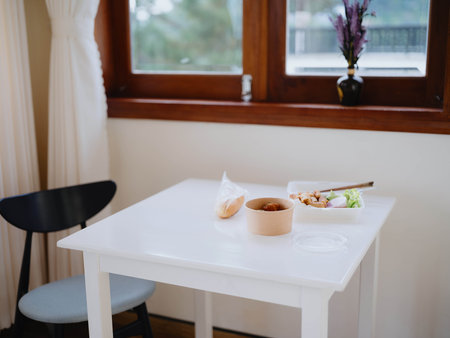 Food from delivery on the table in plastic utensils, a fast food conceptの写真素材