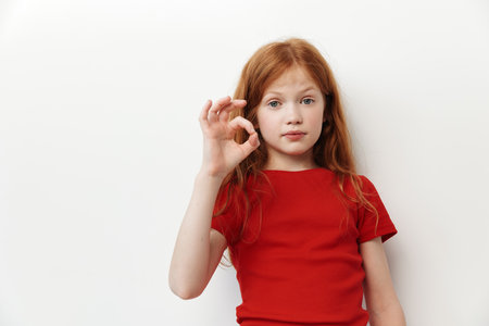 Childhood small isolated adorable girl cute background little female portrait young caucasian personの写真素材