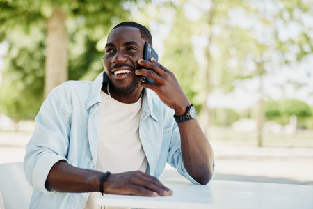 Handsome guy happy technology lifestyle male person portrait young men adult phoneの写真素材