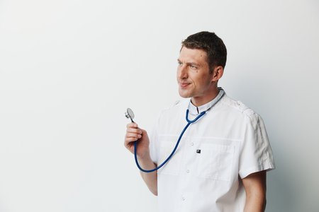Man professional background health physician portrait stethoscope doctor hospital man care person adult medicineの写真素材