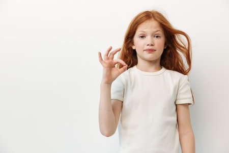 Young woman isolated female background girl cute person portrait face pretty caucasian white studioの写真素材