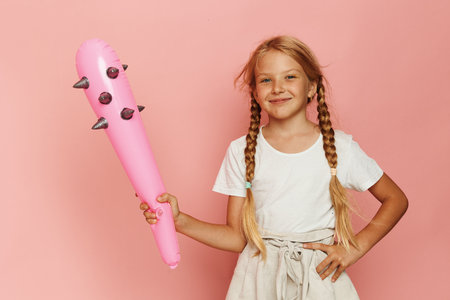 Sweet Little Girl Embracing Childhood: A Colorful Portrait Collectionの写真素材