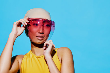 Portrait woman smile swimsuit summer trendy face hat fun fashion beauty young eyes sunglassesの写真素材