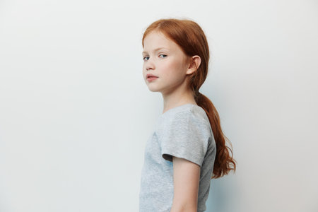 Girl person portrait little cute face expression unhappy sad young childhood femaleの写真素材