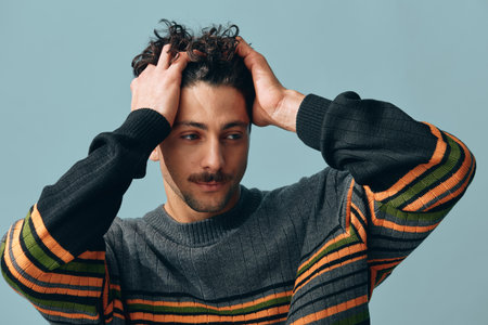 Smile man face sweater trendy background handsome copyspace portrait hipster male positive fashionの写真素材