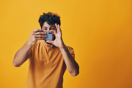 Phone mobile handsome technology young casual adult portrait smartphone men background guy personの写真素材