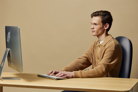 Working from Home: Productive and Professional Caucasian Man Using Laptop in Modern Office Interior