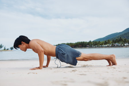 Fit Asian Man: Muscular, Active, and Free at Sunset Beach