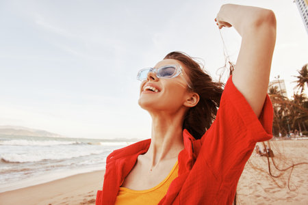 Smiling Woman on the Beach, Embracing Freedom and Joy under the Colorful Sunset