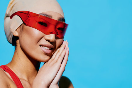 Woman emotion portrait sunglasses blue asian glamour black red beauty smiling fashion hair white